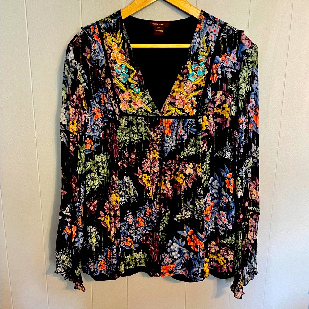 Embroidered multi-colored peasant blouse.